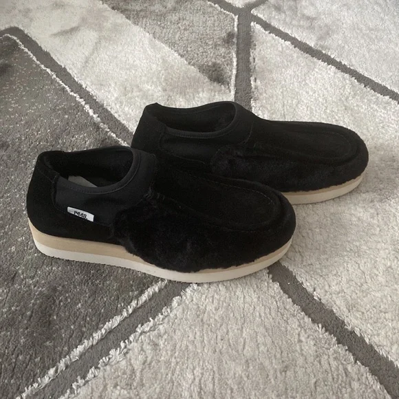P448 bubble Genuine shearling slip on sneakerin black